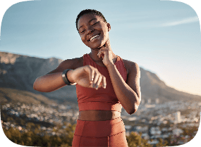 Picture of a woman checking her pulse after exercising